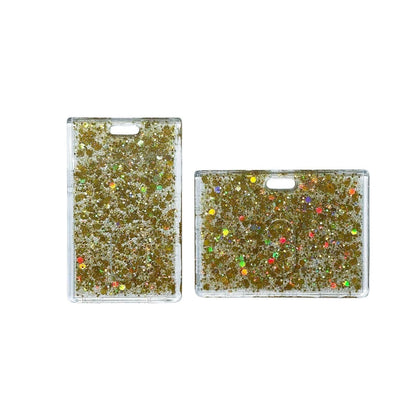 Two gold glittery card holders on a clear background