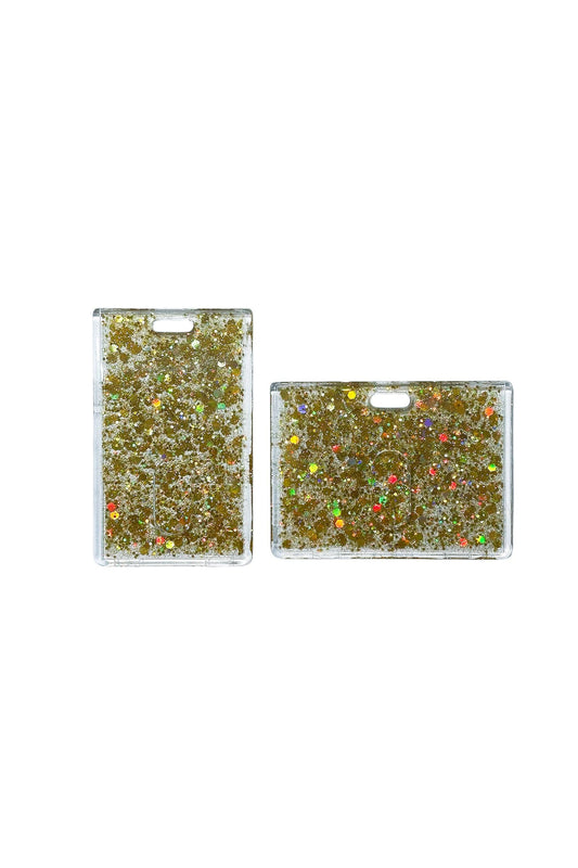 Two gold glittery card holders on a clear background