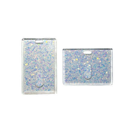 Two glittery card holders on a clear background
